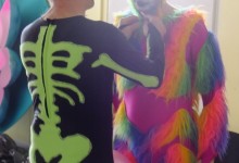 Charles Beauchamp of Mandinga Arts helping a participant with their costume, Hitchin Carnival, 7 July 2012
