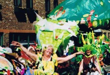 One of the adult partcipants dancing in the carnival parade with a clear view of the Chapel Street School’s costumes.