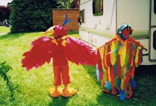 The back of two parrot costumes.