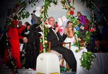 A man and a woman dressed as a bride and groom at Cromer Carnival 2012
