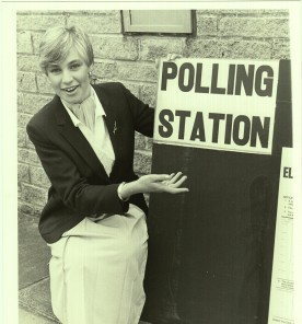 Northampton Carnival Queen Louise Rolfe at a polling station, 1983