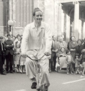 George Twiselton on Tandem Bedstead bicycle, Northampton Carnival, 1952